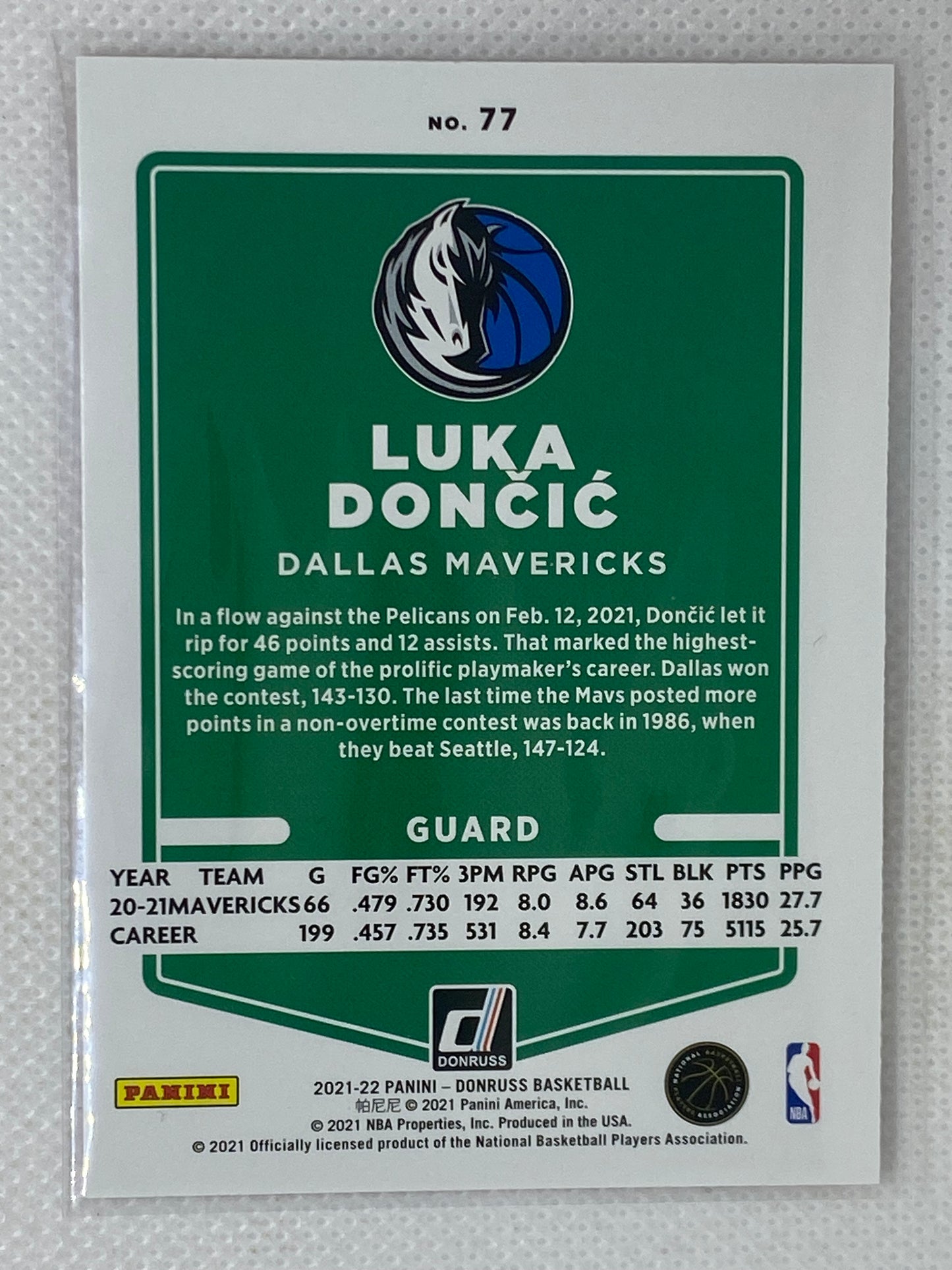 2021-22 Panini Donruss Luka Doncic Orange Laser Holo #77 Dallas Mavericks