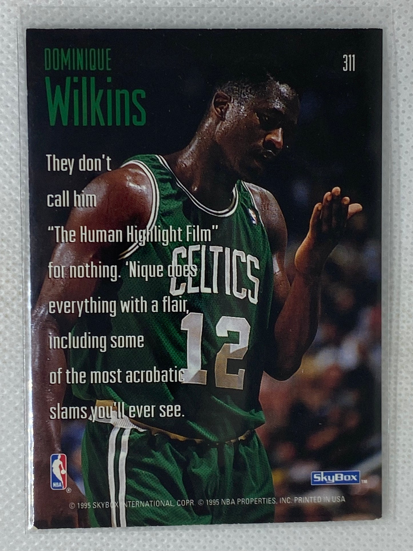 1994-95 SkyBox #311 Dominique Wilkins Sky Slams Boston Celtics