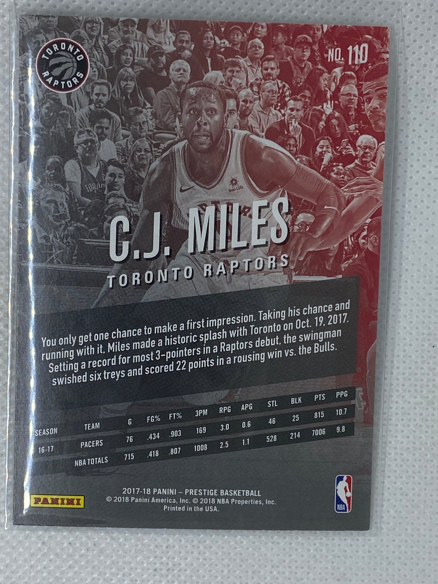 2017-18 Panini Prestige #110 C.J. Miles Toronto Raptors w Drake in Stands